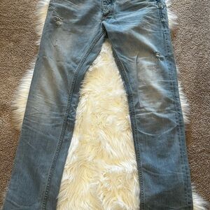 Distressed Blue Denim Jeans